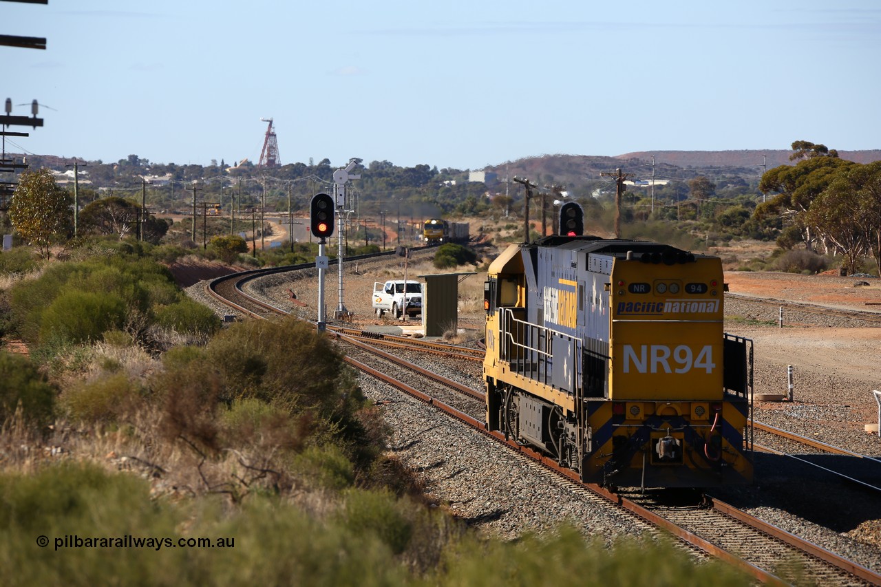 160531 9885
West Kalgoorlie, Pacific National's Goninan built GE model Cv40-9i NR class unit NR 94 serial 7250-06/97-300, shunts off 3PM4 steel train to collect the loading and crew coach sitting in the yard. 31st of May 2016.
Keywords: NR-class;NR94;Goninan;GE;Cv40-9i;7250-06/97-300;