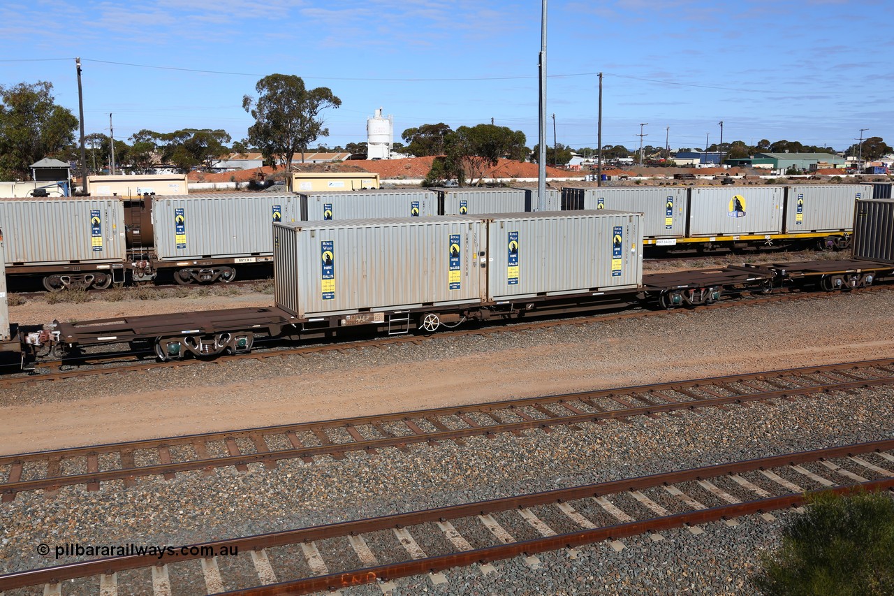 160531 9905
West Kalgoorlie, 1MP2 steel train, container waggon RQWW 22022, one of thirty two JCW type waggons built by Comeng NSW in 1973-74, loaded with two 20' Royal Wolf containers, RWMC 815948 and RWMC 815868.
Keywords: RQWW-type;RQWW22022;Comeng-NSW;JCW-type;NQJW-type;