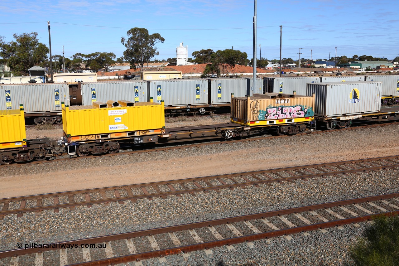 160531 9909
West Kalgoorlie, 1MP2 steel train, container waggon RQHY 7078, the final one of seventy eight built in 2005 by Qiqihar Rollingstock Works in China, with two 20' steel coil 'butter boxes'.
Keywords: RQHY-type;RQHY7078;Qiqihar-Rollingstock-Works-China;