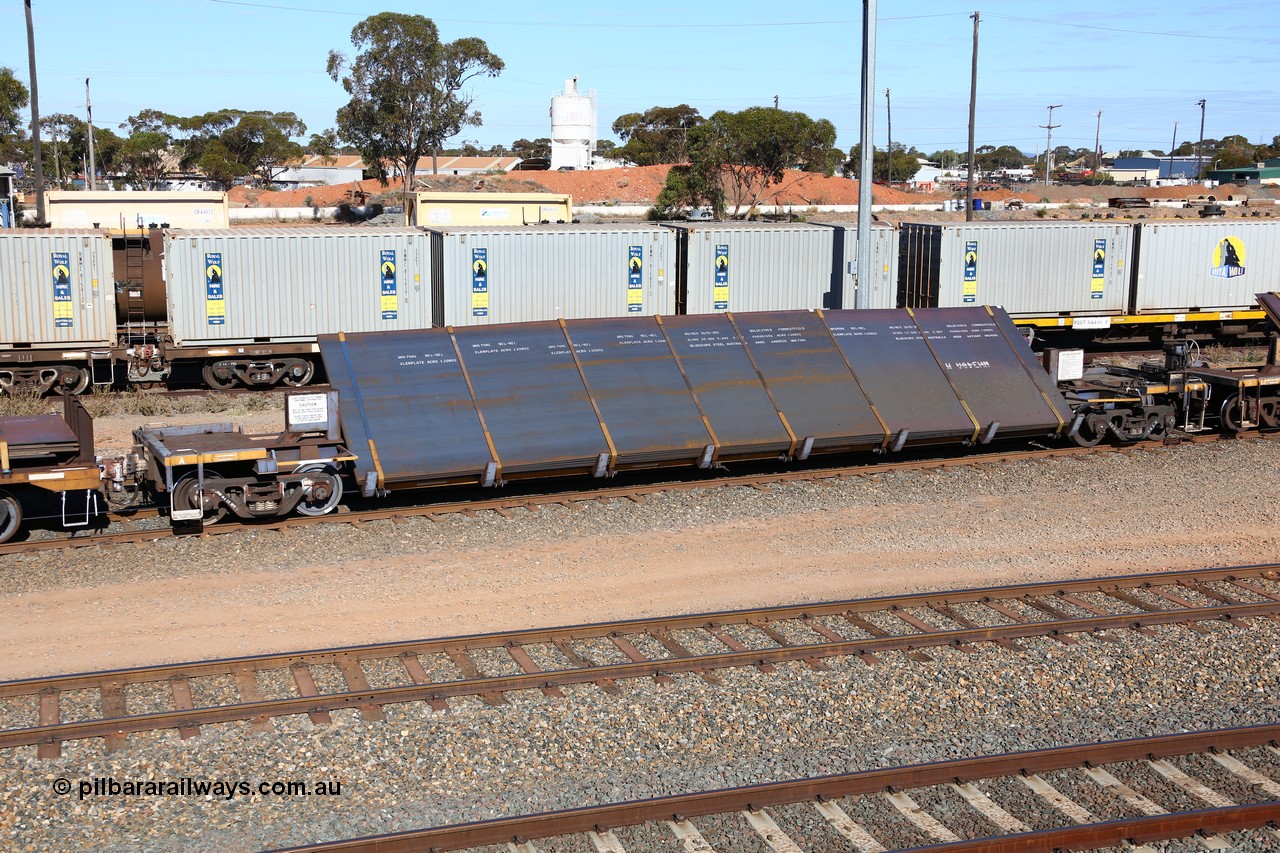 160531 9924
West Kalgoorlie, 1MP2 steel train, RKYY type wide steel plate tilt waggon RKYY 7105, one of twenty seven units built by AN Rail Islington Workshops in 1995-96. Loaded with steel plate.
Keywords: RKYY-type;RKYY7105;AN-Islington-WS;