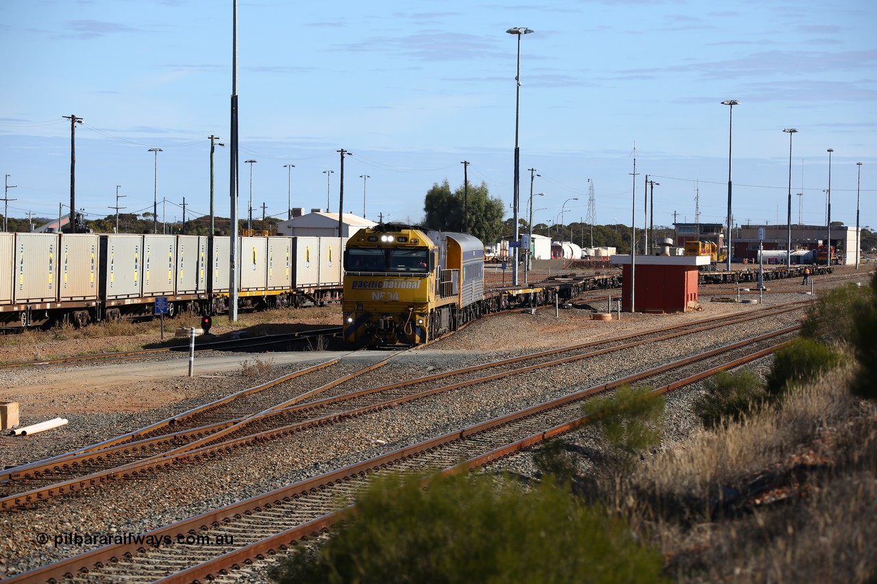 160531 9934
West Kalgoorlie, 3PM4 steel train, Goninan built GE model Cv40-9i NR class unit NR 94 serial 7250-06/97-300 shunts empty container waggons from the yard to put on the front of its train for the journey back east.
Keywords: NR-class;NR34;Goninan;GE;Cv40-9i;7250-06/97-300;