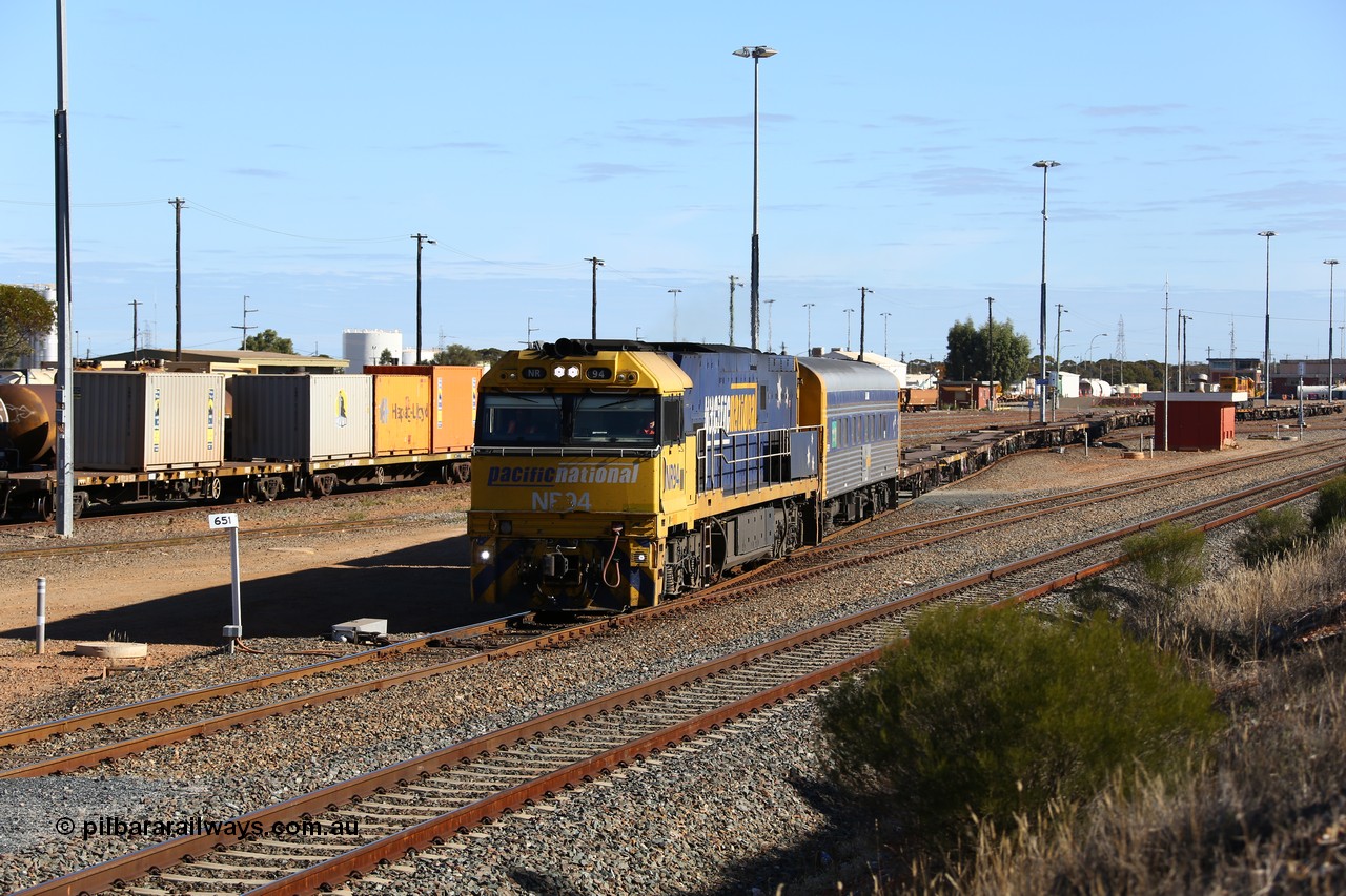 160531 9936
West Kalgoorlie, 3PM4 steel train, Goninan built GE model Cv40-9i NR class unit NR 94 serial 7250-06/97-300 shunts empty container waggons from the yard past the 651 km post, to put on the front of its train for the journey back east.
Keywords: NR-class;NR34;Goninan;GE;Cv40-9i;7250-06/97-300;