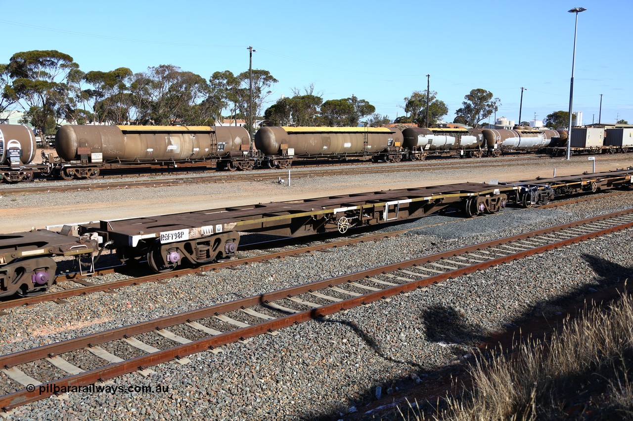 160531 9952
West Kalgoorlie, 3PM4 steel train, empty RQFY 98 container waggon, built by Victorian Railways Bendigo Workshops in 1980 as a batch of seventy five VQFX type skeletal container waggons, recoded to VQFY c1985, then RQFY May 1994, May 1995 to RQFF, then 2CM bogies fitted in Aug 1995 and current code Jan 1997.
Keywords: RQFY-type;RQFY98;Victorian-Railways-Bendigo-WS;VQFX-type;