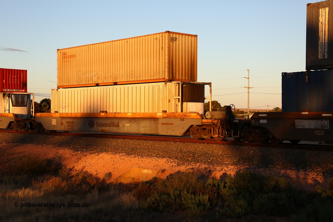 160601 10126
West Kalgoorlie, 2MP5 intermodal train, RQZY 7036 platform 5 of 5-pack well waggon set one of thirty two waggon sets built by Goninan NSW for National Rail in 1995-96, 46' RAND reefer RAND 34 and an SCF Rail Containers 40' box SCFU 410215 on top.
Keywords: RQZY-type;RQZY7036;Goninan-NSW;