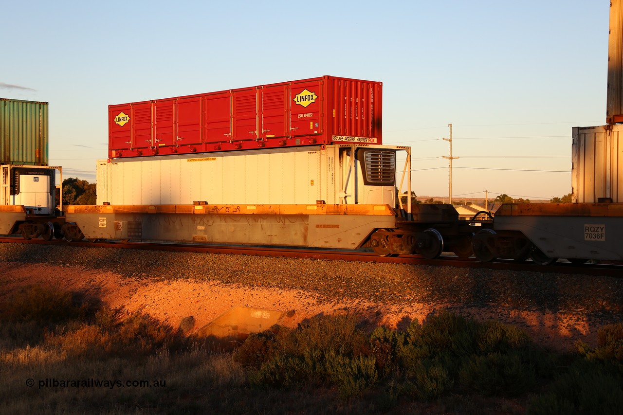 160601 10127
West Kalgoorlie, 2MP5 intermodal train, RQZY 7036 platform 4 of 5-pack well waggon set one of thirty two waggon sets built by Goninan NSW for National Rail in 1995-96, 46' ARLS reefer ARLS 482 and a Linfox 40' half height side door container LSDU 694003 on top.
Keywords: RQZY-type;RQZY7036;Goninan-NSW;