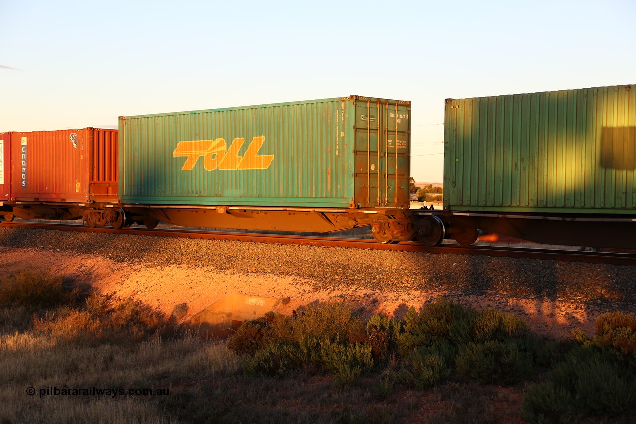 160601 10135
West Kalgoorlie, 2MP5 intermodal train, RRGY 7133 48' platform 4 of 5-pack articulated skel waggon, one of fifty built by AN Rail Islington Workshops in 1996-97 as type RRBY, later rebuilt with 48' intermediate decks and coded RRGY, with a 40' Toll box TRRC 410624.
Keywords: RRGY-type;RRGY7133;AN-Islington-WS;RRBY-type;