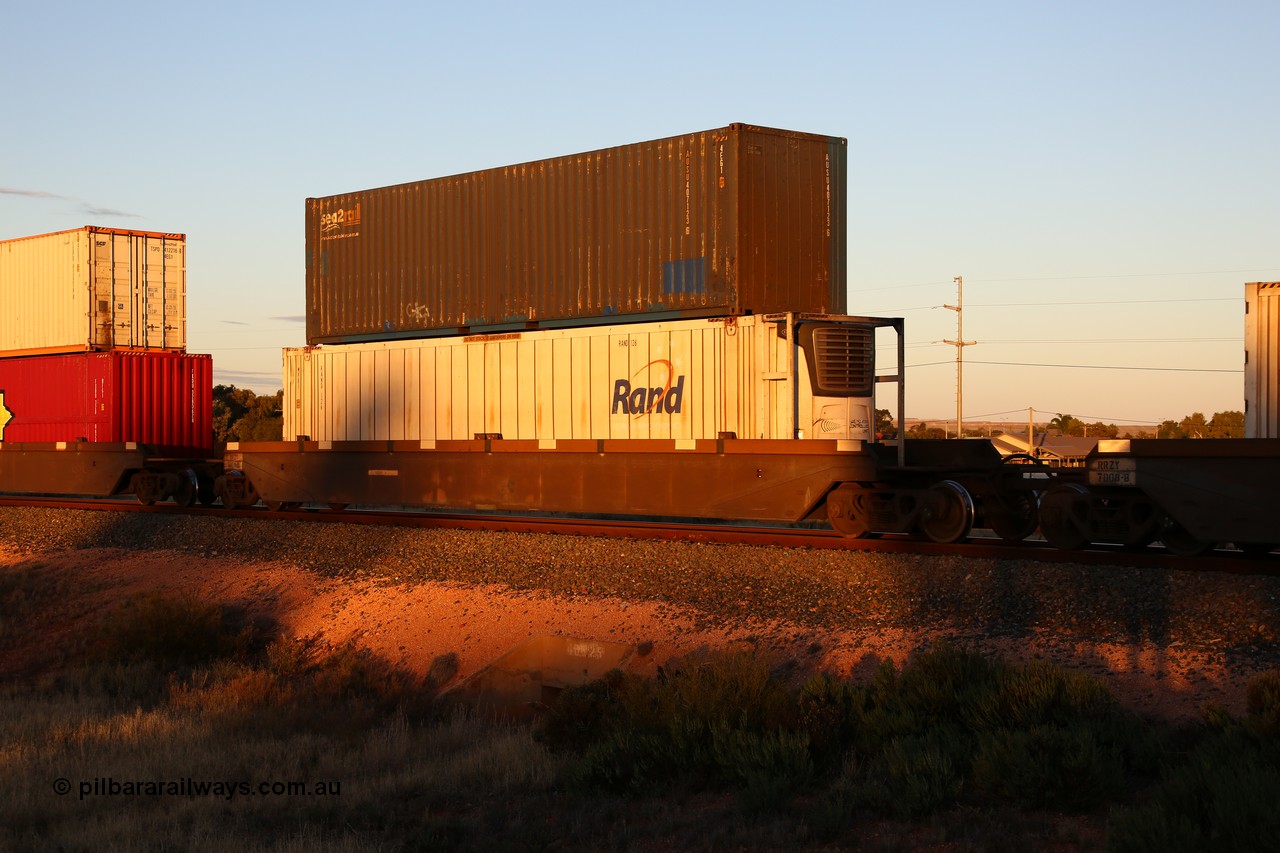 160601 10147
West Kalgoorlie, 2MP5 intermodal train, RRZY 7008 platform 3 of 5-pack well waggon set, the prototype of the RQZY type, first of twenty six sets built by Goninan in 1995-96 for National Rail, later rebuilt and recoded RRZY with a RAND Refrigerated Logistic 46' reefer RAND 126 and an SCF sea2rail 40' box AUSU 407123 on top.
Keywords: RRZY-type;RRZY7008;Goninan-NSW;RQZY-type;