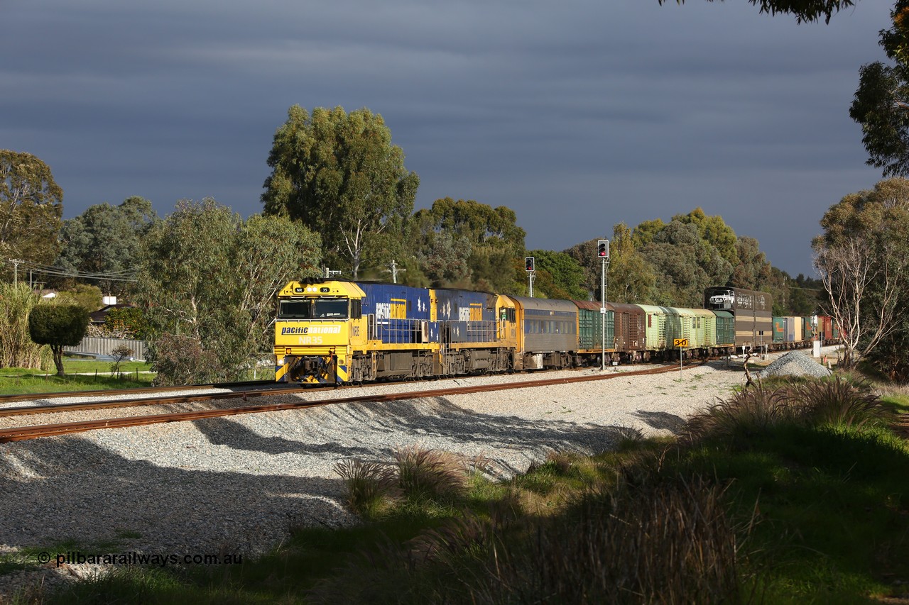 160609 0387
Woodbridge, 5PM5 intermodal train arrives at the triangle and splits signal post 82 and 84 with power from Goninan built GE model Cv40-9i NR class unit NR 35 serial 7250-06/97-237 and a sister unit with 39 waggons for a length of 1791 metres and 3960 tonnes.
Keywords: NR-class;NR35;Goninan;GE;Cv40-9i;7250-06/97-237;