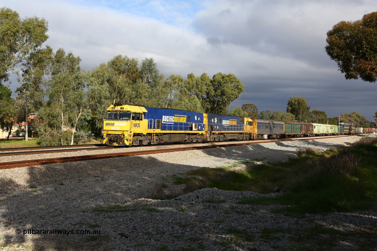 160609 0389
Woodbridge, 5PM5 intermodal train arrives at the triangle and splits signal post 82 and 84 with power from Goninan built GE model Cv40-9i NR class unit NR 35 serial 7250-06/97-237 and a sister unit with 39 waggons for a length of 1791 metres and 3960 tonnes. Behind the crew coach are the Sadleirs louvre vans and an RMEY triple deck articulated car carrying waggon.
Keywords: NR-class;NR35;Goninan;GE;Cv40-9i;7250-06/97-237;