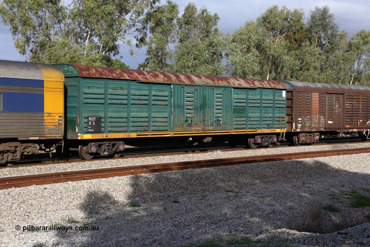 160609 0393
Woodbridge, 5PM5 intermodal train, VLEY 2 louvre van, started life as Victorian Railways Newport Workshops built VSX type type louvre van VSX 906 in 1974, recoded to VLEX in 1979 and to VLNX 2 in 1981 for newsprint traffic, then RLNX in 1995, again recoded for rice traffic to VLRX in 2003 and then possibly to VLEY sometime after 2005. In Freight Australia green with yellow band.
Keywords: VLEY-type;VLEY2;Victorian-Railways-Newport-WS;VSX-type;VSX906;VLNX-type;RLNX-type;VLRX-type;