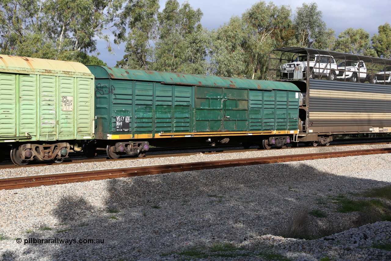 160609 0398
Woodbridge, 5PM5 intermodal train, VLEY 16 louvre van, started life as Victorian Railways Ballarat North Workshops built VSX type louvre van VSX 1048 in 1976, recoded to VLEX in 1979, VLEY in 1980, and to VLNX 2 in 1981 for newsprint traffic, again recoded for rice traffic to VLRX in 2003 and then possibly back to VLEY sometime after 2005. In Freight Australia green with yellow band.
Keywords: VLEY-type;VLEY16;Victorian-Railways-Ballarat-Nth-WS;VSX-type;VSX1048;VLEW-type;VLNX-type;VLRX-type;