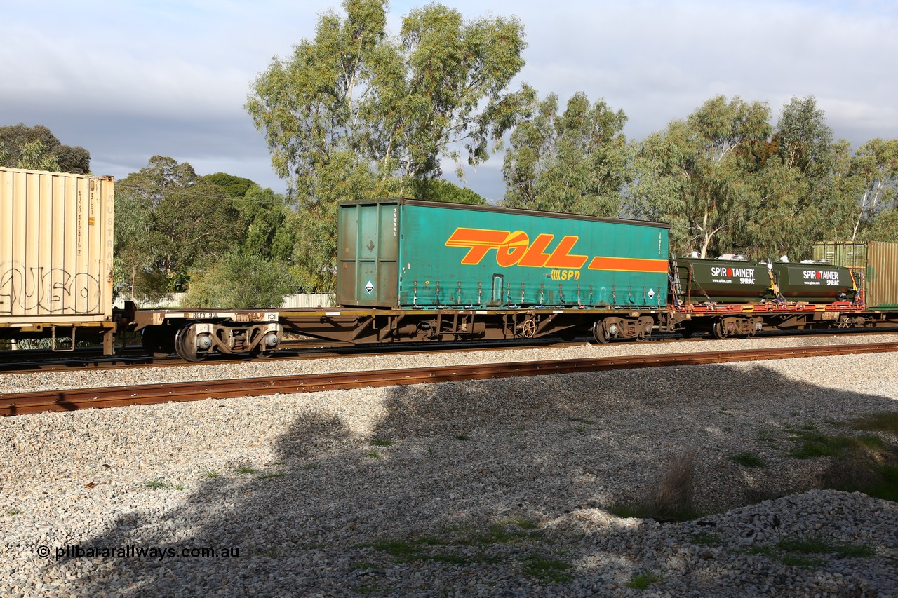 160609 0402
Woodbridge, 5PM5 intermodal train, RQFY 95 container waggon, built by Victorian Railways Bendigo Workshops in 1980 as a batch of seventy five VQFX type skeletal container waggons, recoded to VQFY c1985, then RQFY May 1994, May 1995 to RQFF, then 2CM bogies fitted in Aug 1995 and current code Nov 1995.
Keywords: RQFY-type;RQFY95;Victorian-Railways-Bendigo-WS;VQFX-type;