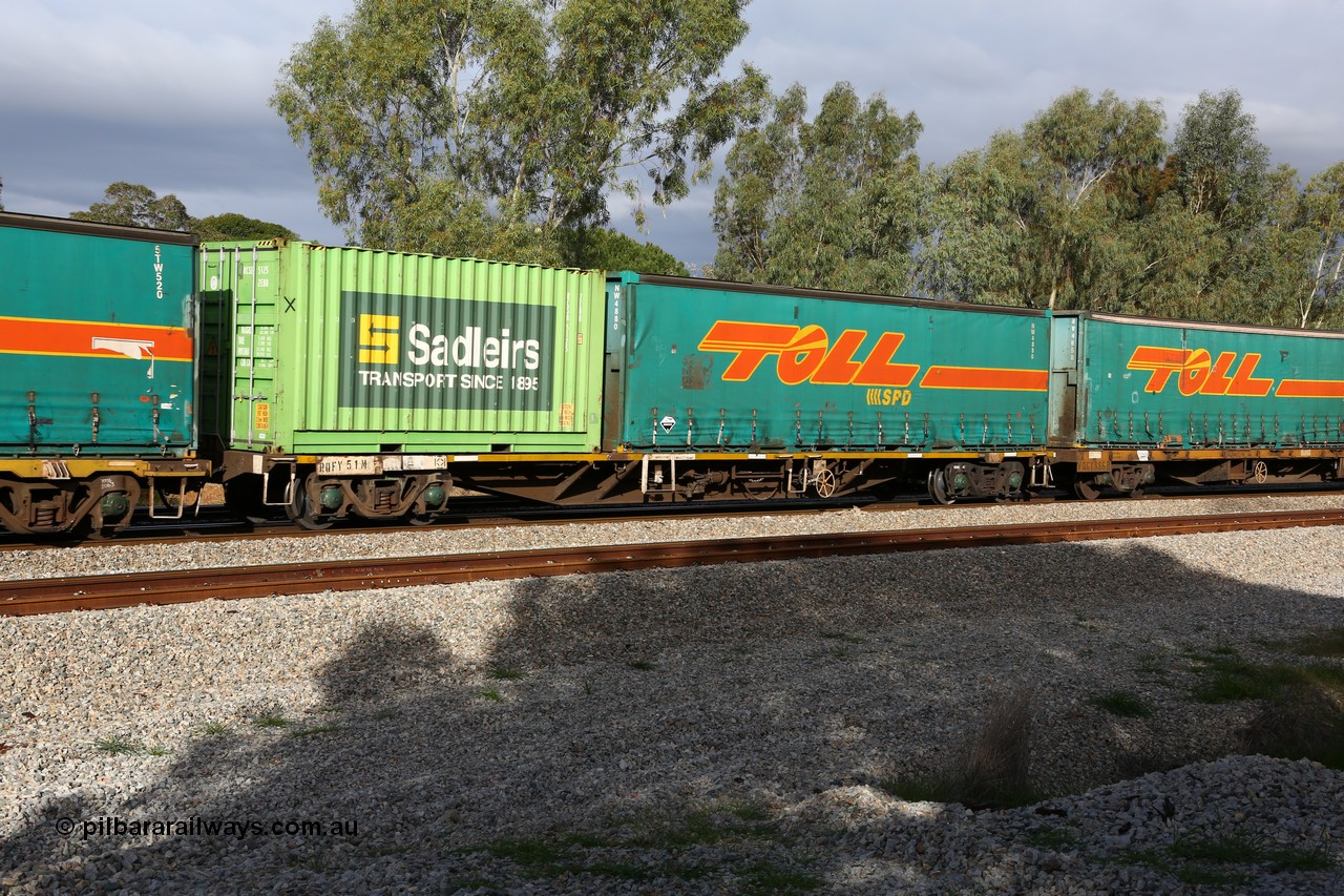 160609 0408
Woodbridge, 5PM5 intermodal train, RQFY 51 container waggon, built by Victorian Railways Newport Workshops in 1978 in a batch of twenty as QMX type skeletal container waggons, Aug 1981 to VQFX, April 1994 to RQFX.
Keywords: RQFY-type;RQFY51;Victorian-Railways-Newport-WS;QMX-type;VQFX-type;