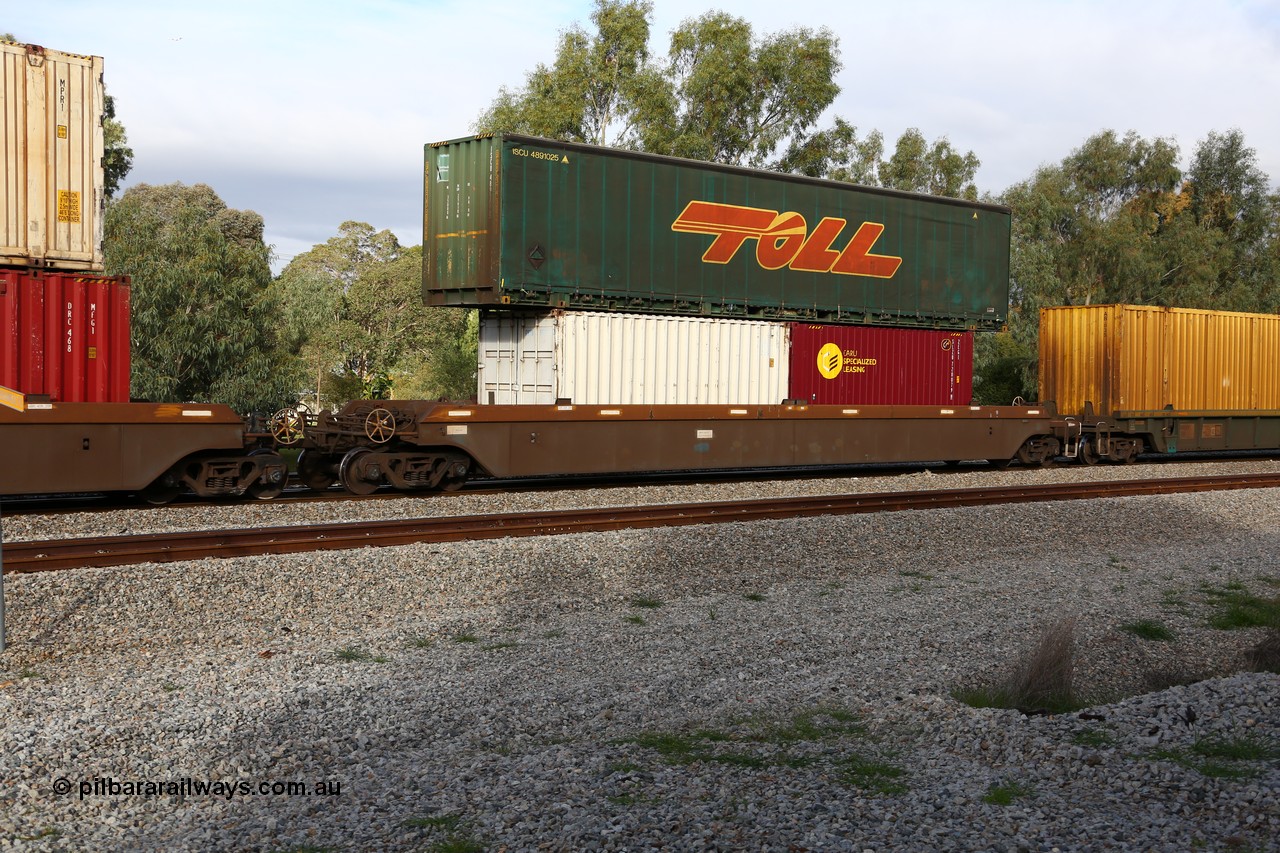 160609 0420
Woodbridge, 5PM5 intermodal train, platform 5 of 5-pack RRRY 7008 well waggon set, one of nineteen built in China at Zhuzhou Rolling Stock Works for Goninan in 2005, two 20' boxes Royal Wolf RWTU and CARU Specialized Leasing SLZU 720079 with a 48' curtainsider ISCU 4891025 on top.
Keywords: RRRY-type;RRRY7008;CSR-Zhuzhou-Rolling-Stock-Works-China;