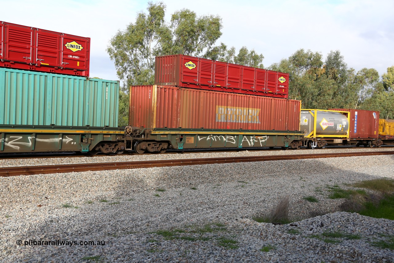 160609 0425
Woodbridge, 5PM5 intermodal train, RRXY 9 platform 1 of 5-pack well waggon set, one of eleven built by Bradken Qld in 2002 for Toll from a Williams-Worley design with a 53' Patrick automobile box A 066 and a 40' Linfox half height side door unit LSDU 694000 on top.
Keywords: RRXY-type;RRXY9;Williams-Worley;Bradken-Rail-Qld;