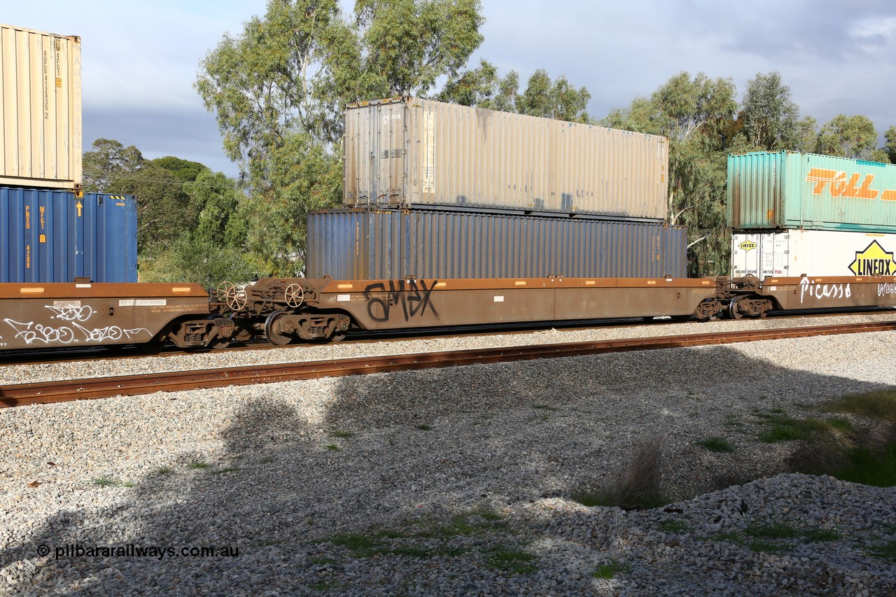 160609 0451
Woodbridge, 5PM5 intermodal train, platform 2 of 5-pack RRRY 7011 well waggon set, one of nineteen built in China at Zhuzhou Rolling Stock Works for Goninan in 2005, Pacific National 48' box PNXD 005 with no signage and SCF 40' box SCFU 470753 on top.
Keywords: RRRY-type;RRRY7011;CSR-Zhuzhou-Rolling-Stock-Works-China;