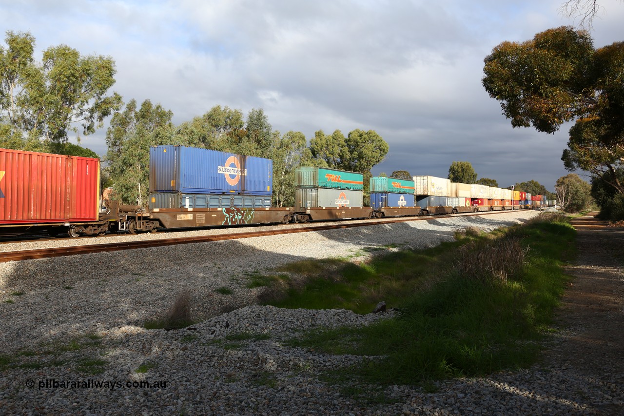 160609 0463
Woodbridge, 5PM5 intermodal train, RRZY 7008 5-pack well waggon set, the prototype of the RQZY type, first of twenty six sets built by Goninan in 1995-96 for National Rail, later rebuilt and recoded RRZY and RRZY 7049 5-pack well waggon set part of a batch of thirty two sets of RQZY type built by Goninan in 1995-96 for National Rail and also later rebuilt and recoded RRZY with double stacked loading.
Keywords: RRZY-type;RRZY7008;Goninan-NSW;RQZY-type;