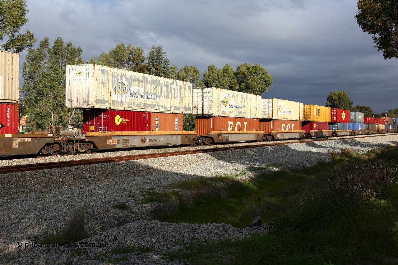 160609 0469
Woodbridge, 5PM5 intermodal train, RRZY 7049 5-pack well waggon set, one of thirty two sets built by Goninan NSW in 1995-96 for National Rail as RQZY type, recoded to RRZY when repaired loaded with double stacked container loading.
Keywords: RRZY-type;RRZY7049;Goninan-NSW;RQZY-type;