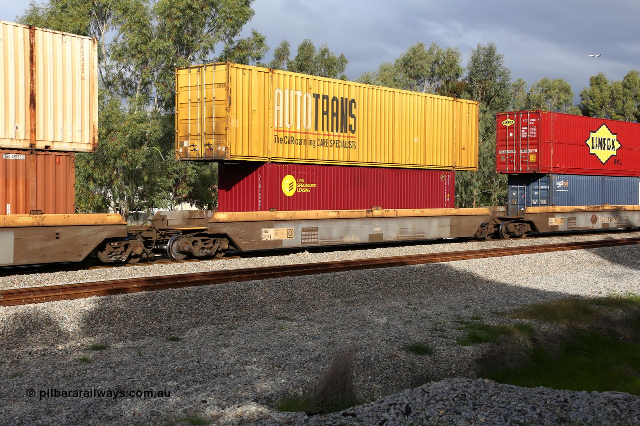 160609 0473
Woodbridge, 5PM5 intermodal train, RRZY 7049 platform 2 of 5-pack well waggon set, one of thirty two sets built by Goninan NSW in 1995-96 for National Rail as RQZY type, recoded to RRZY when repaired with a CARU Specialized Leasing 40' 4EG1 type box SLZU 740007 and a 53' AutoTrans box AB 040.
Keywords: RRZY-type;RRZY7049;Goninan-NSW;RQZY-type;