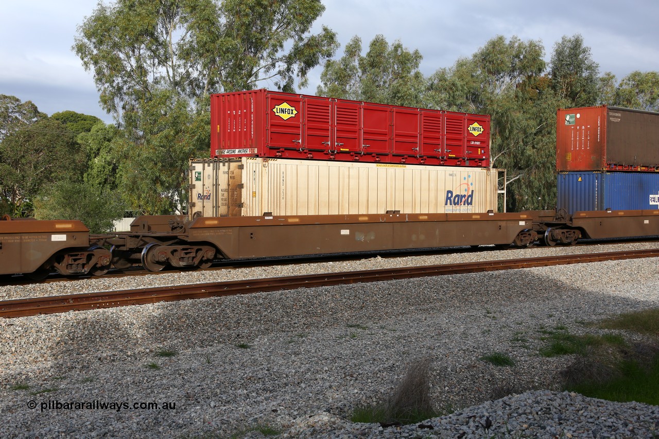 160609 0478
Woodbridge, 5PM5 intermodal train, platform 3 of 5-pack RRRY 7012 well waggon set, one of nineteen built in China at Zhuzhou Rolling Stock Works for Goninan in 2005, 46' RAND Refrigerated Logistics reefer RAND 236 and 40' Linfox half height side door LSDU 694009 container on top.
Keywords: RRRY-type;RRRY7012;CSR-Zhuzhou-Rolling-Stock-Works-China;