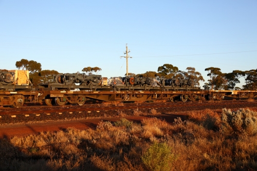 160522 2038
Parkeston, 5MP2 steel train, RQCY type flat waggons RQCY 701 carrying the bogies for Trans-Perth B Set 116. Originally built by the Victorian Railways Newport Workshops as an FQX type container waggon in 1973, recoded to VQCX in 1979, then to NRC as RQCX, then the current code from 1995.
Keywords: RQCY-type;RQCY701;Victorian-Railways-Newport-WS;FQX-type;VQCX-type;RQCX-type;