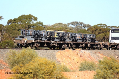 160522 2078
Binduli, 5MP2 steel train, view from rear looking at NQOY 15056 and RQCY 701 loaded with bogies for Trans-Perth B set 116. NQOY type waggon built by Comeng NSW in batch of seventy OCY type waggons in 1974/75.
Keywords: NQOY-type;NQOY15056;Comeng-NSW;OCY-type;RQCY-type;RQCY701;