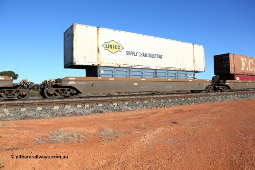 160522 2100
Parkeston, 6MP4 intermodal train, platform 2 of 5-pack RRRY 7006 well waggon set, one of nineteen built in China at Zhuzhou Rolling Stock Works for Goninan in 2005, SCF SCFU 200557 half height side door container and Linfox DRC 366 53' container.
Keywords: RRRY-type;RRRY7006;CSR-Zhuzhou-Rolling-Stock-Works-China;