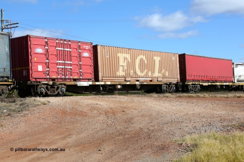 160522 2360
Parkeston, 7MP7 priority service train, RQSY 34975 container waggon, one of one hundred OCY type container waggons built by Goninan in 1975, recoded to NQOY. Loaded with a 40' FCL box FCGU 964372[0] and a 20' Cahill Transport 2FG4 type side door CHLL 200023[7].
Keywords: RQSY-type;RQSY34975;Goninan-NSW;OCY-type;NQOY-type;