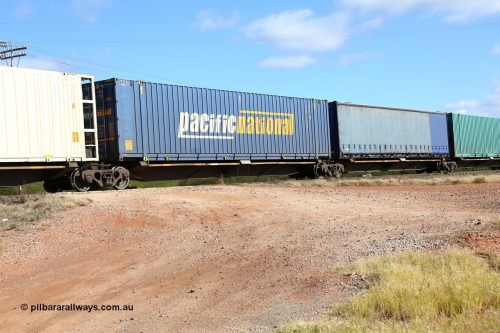 160522 2423
Parkeston, 7MP7 priority service train, RQQY 7079 platform 2 of 5-pack articulated skel waggon set, 1 of 17 built by Qld Rail at Ipswich Workshops in 1995, Pacific National 48' MFG1 type box PNXD 4209.
Keywords: RQQY-type;RQQY7079;Qld-Rail-Ipswich-WS;