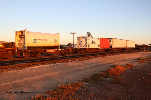 160523 2734
Parkeston, 1PM5 intermodal train, RRAY 7194 5-pack articulated skel waggon set, one of a hundred built by ABB Engineering NSW 1996-2000, with an Air Liquide 20' tanktainer IS 16-8 and Cryeng 20' tanktainer CRYU 000338, 20' box, two 46' 6