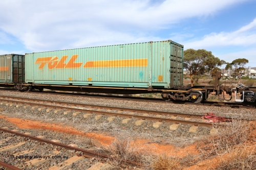 160523 2955
Parkeston, 7SP3 intermodal train, RRYY 34 platform 1 of 5-pack articulated low profile skel waggon set, one of fifty two such sets built by Bradken Rail Braemar from a Williams-Worley design, based on the TNT TRAY type for moving automotive carrying containers, 48' Toll TCML 48438 box.
Keywords: RRYY-type;RRYY34;Williams-Worley;Bradken-NSW;