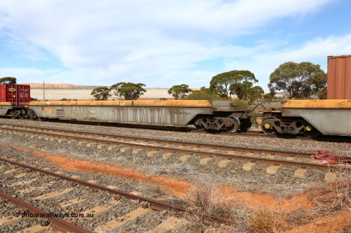 160523 2964
Parkeston, 7SP3 intermodal train, RQZY 7053 platform 2 of five unit bar coupled well container waggon set built in a batch of thirty two by Goninan NSW in 1995/96, empty.
Keywords: RQZY-type;RQZY7053;Goninan-NSW;