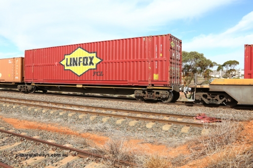 160523 2967
Parkeston, 7SP3 intermodal train, RRQY 8519 platform 1 of 5-pack articulated skel waggon set, built by Qiqihar Rollingstock Works, China in 2015, loaded with a 48' Linfox-FCL high box FXDU 328062.
Keywords: RRQY-type;RRQY8519;Qiqihar-Rollingstock-Works-China;
