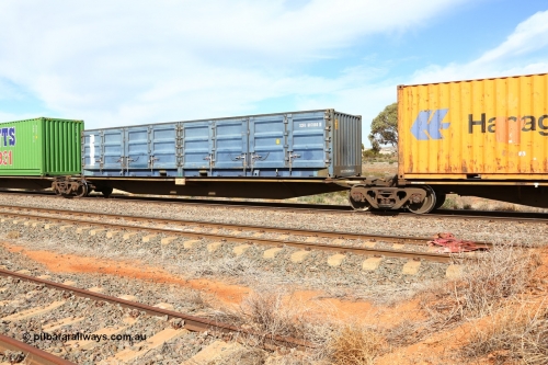 160523 2976
Parkeston, 7SP3 intermodal train, RRGY 7142 platform 4, RRGY type is a 5-pack articulated skeletal container waggon, one of fifty originally built by AN Rail Islington Workshops in 1996-97 as type RRBY, later rebuilt with 48' intermediate decks and recoded to RRGY. Loaded with an SCF 40' half height side door container SCFU 607080[9].
Keywords: RRGY-type;RRGY7142;AN-Islington-WS;RRBY-type;