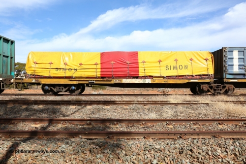 160523 2994
Parkeston, 7SP3 intermodal train, RQEY 1957 2-pack container waggon, platform 2, originally built by Comeng Qld as the first of forty LEX type louvre waggons in 1966-67, recoded to ALEX, converted to AQEY, recoded to RQEY. Loaded with a Simon 40' flatrack FD 131 with a Simon tarped load.
Keywords: RQEY-type;RQEY1957;Comeng-Qld;LEX-type;ALEX-type;AQEY-type;