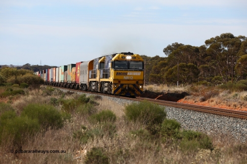 160523 3203
Binduli, Perth bound 7SP3 intermodal train, a pair of Goninan built GE model Cv40-9i NR class units NR 12 serial 7250-02/97-214 and NR 51 serial 7250-08/97-253 lead the train 'elephant style' near the 641 km.
Keywords: NR-class;NR12;Goninan;GE;Cv40-9i;7250-02/97-214;