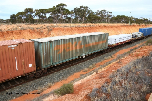 160524 3784
West Kalgoorlie, 2PM6 intermodal train, RRGY 7144 platform 3 of 5-pack articulated skeletal waggon set, one of fifty originally built by AN Rail Islington Workshops in 1996-97 as type RRBY, later rebuilt with 48' intermediate decks and recoded to RRGY, Toll 48' box TERF 48071.
Keywords: RRGY-type;RRGY7144;AN-Islington-WS;RRBY-type;