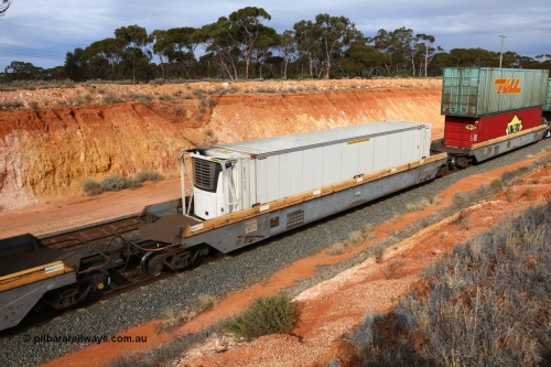 160524 3822
West Kalgoorlie, 2PM6 intermodal train, RQZY 7041 platform 2 of 5-pack well waggon set, one of thirty two sets built by Goninan NSW in 1995-96 for National Rail loaded with an ARLS 46' 6