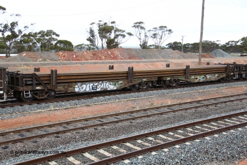 160524 4307
West Kalgoorlie, 1MP2 steel train, RKAX 13, 2-pack rail transport waggon, this waggon was converted by Port Augusta Workshops from two original FBX type waggons built in 1968-69 by Islington Workshops in a batch of twenty later coded AFCX. AFCX 13 & AKAX 5 where the donors for this waggon. Loaded with a full load of rail strings.
Keywords: RKAX-type;RKAX13;SAR-Islington-WS;FBX-type;