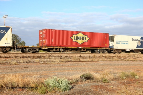 160525 4465
Parkeston, 3PM7 priority service train, RQCY 923 container waggon one of one hundred built by Victorian Railways Bendigo Workshops 1977 as FQX, then VQCX, Linfox 48' box DRC 609.
Keywords: RQCY-type;RQCY923;Victorian-Railways-Bendigo-WS;FQX-type;VQCX-type;RQCX-type;