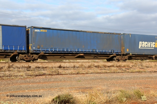 160525 4517
Parkeston, 3PM7 priority service train, RRQY 7327 platform 4 of 5-pack articulated skel waggon set built by Qiqihar Rollingstock Works China in 2005 for Pacific National, with a 48' Pacific National curtainsider PNXM 5237.
Keywords: RRQY-type;RRQY7327;Qiqihar-Rollingstock-Works-China;