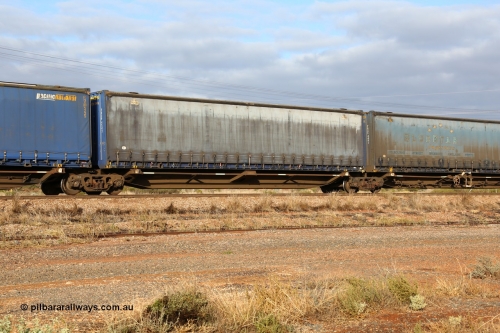 160525 4527
Parkeston, 3PM7 priority service train, RRQY 8344 platform 4 of 5-pack articulated skel waggon set the last of a batch of 41 built by Qiqihar Rollingstock Works China in 2005 for Pacific National, with a Pacific National 48' curtainsider PNXM 4543.
Keywords: RRQY-type;RRQY8344;Qiqihar-Rollingstock-Works-China;