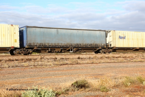 160525 4542
Parkeston, 3PM7 priority service train, RRQY 7330 platform 3 of 5-pack articulated skel waggon, one of sixteen sets built by Qiqihar Rollingstock Works China in 2005, 48' deck with a 48' Pacific National curtainsider PNXM 4533.
Keywords: RRQY-type;RRQY7330;Qiqihar-Rollingstock-Works-China;