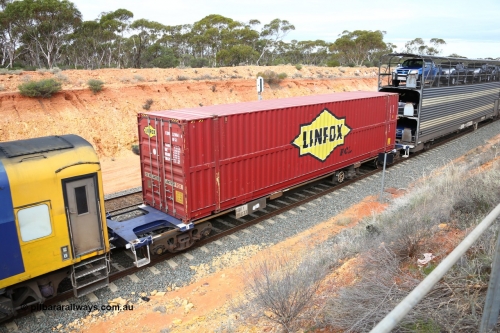 160526 5204
West Kalgoorlie, 4PM6 intermodal train, RQHY 7023 container waggon, one of seventy eight built by Qiqihar Rollingstock Works China in 2005, Linfox - FCL 48' box FXDU 328061.
Keywords: RQHY-type;RQHY7023;Qiqihar-Rollingstock-Works-China;