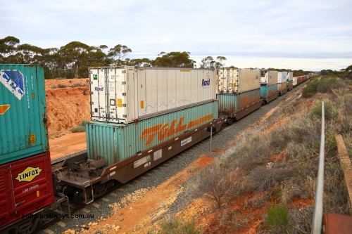 160526 5234
West Kalgoorlie, 4PM6 intermodal train, 5-pack RRRY 7004 well waggon set, one of nineteen built in China at Zhuzhou Rolling Stock Works for Goninan in 2005 double stacked with a range of 40' and 48' boxes and 46' 6