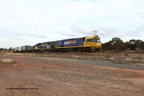 160526 5254
Parkeston, 3MP7 priority service train runs upgrade around the curve bound for Kalgoorlie and Perth behind Goninan built GE model Cv40-9i NR class units NR 82 serial 7250-03/97-284 and NR 49 serial 7250-08/97-251.
Keywords: NR-class;NR82;Goninan;GE;Cv40-9i;7250-03/97-284;