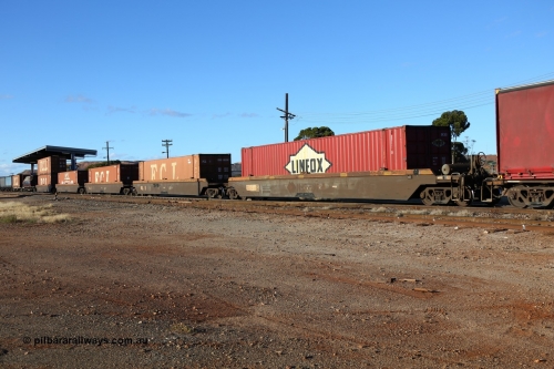 160528 8340
Parkeston, 5SP5 intermodal train, RRZY 7031, originally built by Goninan NSW during 1995/95 as part of thirty four sets of five unit bar coupled well container waggons coded RQZY, recoded to RRZY as repairs were carried out to strengthen them. Loaded with 48' containers, five for FCL coded FBCU containers and one Linfox DRC 931.
Keywords: RRZY-type;RRZY7031;Goninan-NSW;RQZY-type;