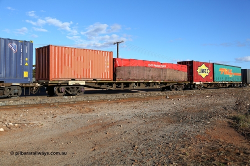 160528 8353
Parkeston, 5SP5 intermodal train, RQKY 2741 originally built by Perry Engineering SA in 1975 as an RMX type motor vehicle flat waggon, recoded to AQMX then AQSY in 1991, to current code in 1994. Loaded with a K+S 40' flatrack with a tarped load and an unmarked 22G1 type 20' box TCKU 191912[7].
Keywords: RQKY-type;RQKY2741;Perry-Engineering-SA;RMX-type;AQMX-type;