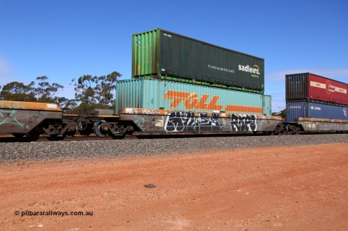 160528 8429
Binduli, intermodal train 6PM6, RQZY 7054 platform 2 of five unit bar coupled well container waggon set built in a batch of thirty two by Goninan NSW in 1995/96, loaded with a Toll 48' MFG1 type container TDDS 486144 double stacked with a Sadleirs 40' curtain sider container RCS 4041.
Keywords: RQZY-type;RQZY7054;Goninan-NSW;
