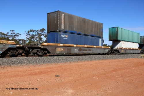 160528 8433
Binduli, intermodal train 6PM6, RQZY 7064 platform 1 of five unit bar coupled well container waggon set built in a batch of thirty two by Goninan NSW in 1995/96, loaded with a Sea2Rail 40' 4EG1 type container SCFU 408288[4] double stacked with Austrans 40' 4EG1 type container AUSU 405030[0].
Keywords: RQZY-type;RQZY7064;Goninan-NSW;